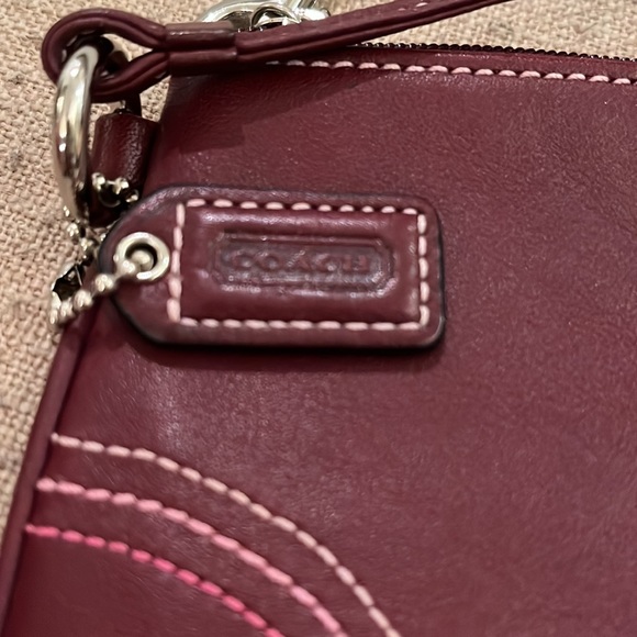 Authentic Coach wine wristlet with tri color stitching - Picture 3 of 4